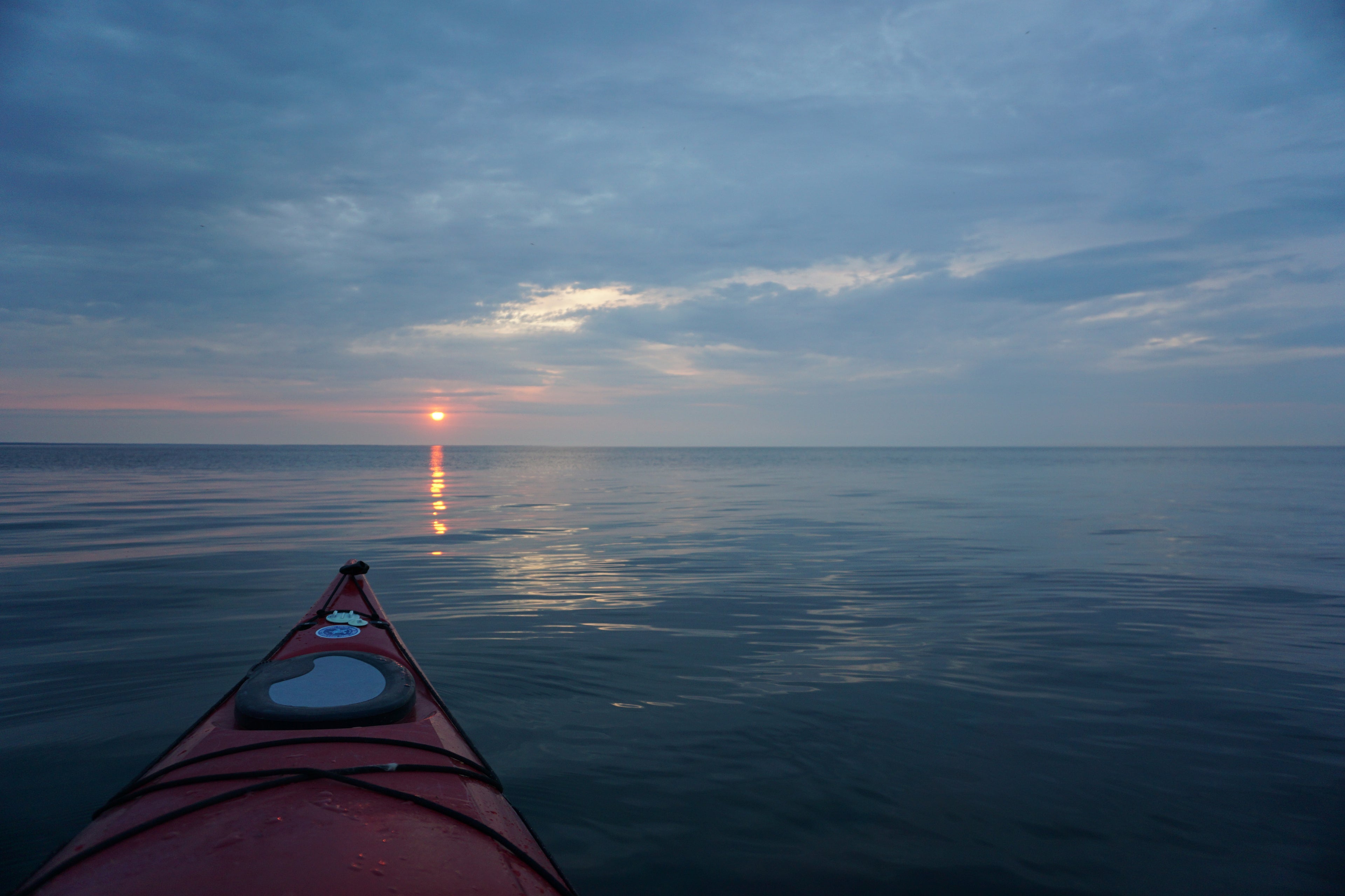 Kayak on Lake Michigan Water During Sunrise